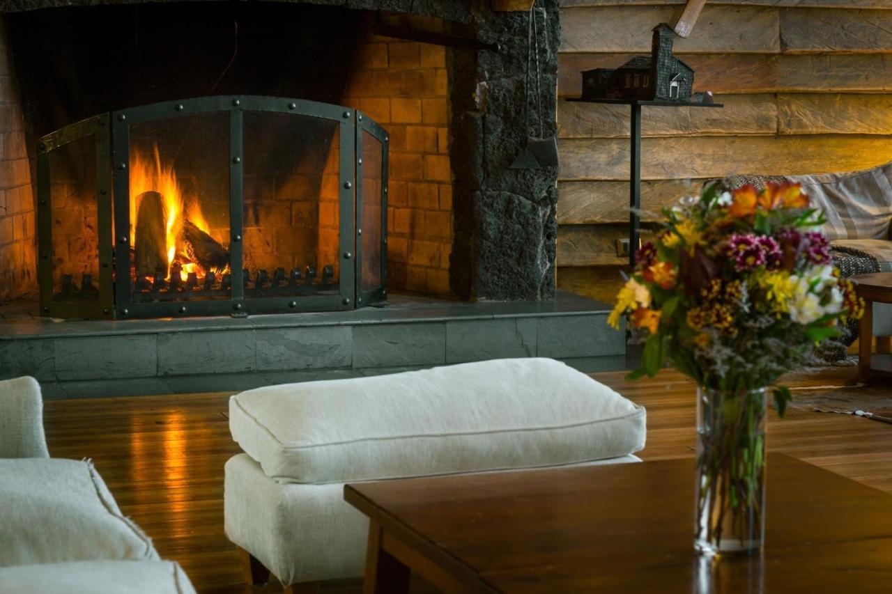 Wyndham Puerto Varas Pettra Exterior photo The fireplace at the Lodge at Blue Hill